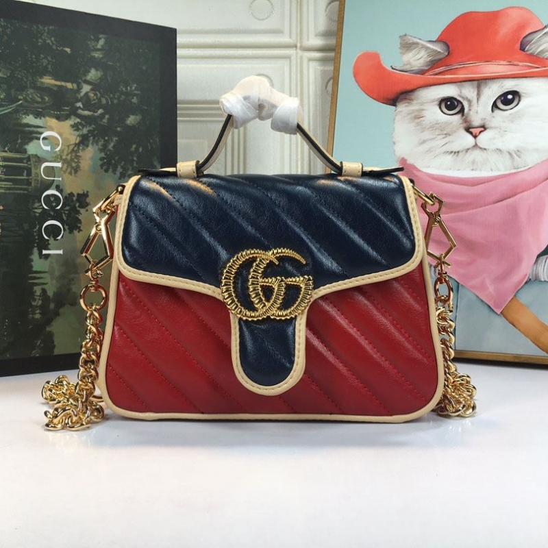 G*u*i top handle bags